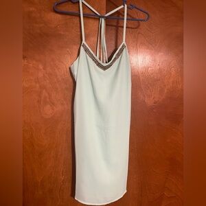 Elegant Light Green Dress with Beaded Neckline